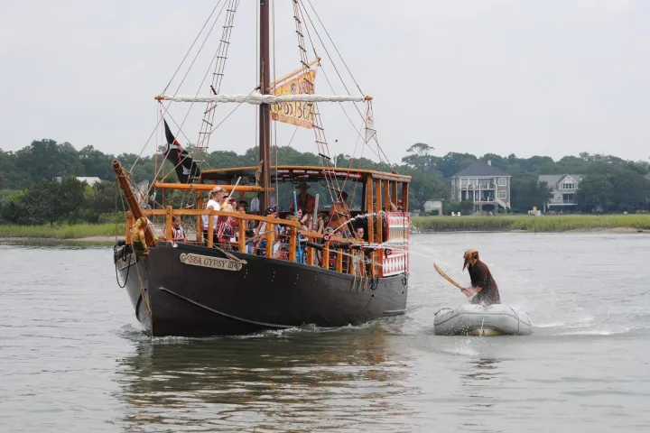 a small boat in a large body of water