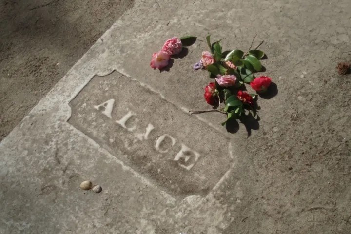 Murrells-Inlet-Ghost-Cruise-image-1.jpg Flowers on the grave of a pretend woman named Alice on our Ghost Tour in Murrells Inlet.