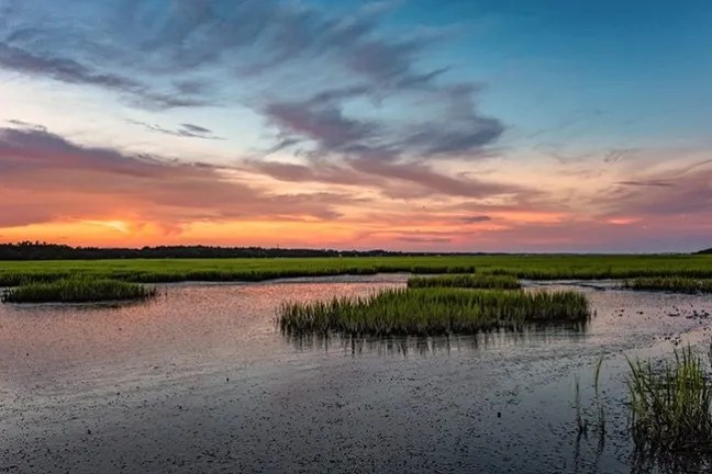 Sunset-Cruise-image-2-1.jpg Beautiful pink and orange sunset view on our Murrells Inlet sunset cruise.